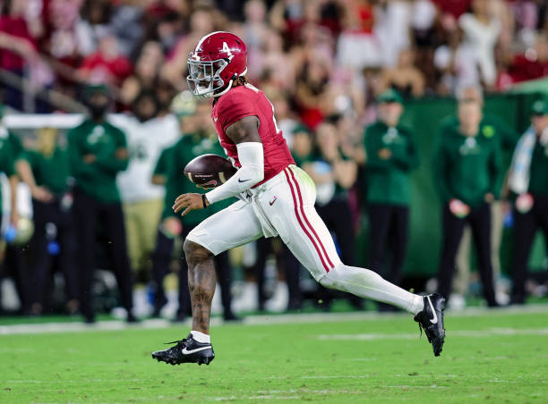 tuscaloosa alabama jalen milroe of the alabama crimson tide runs the ball during the second nhfa7X