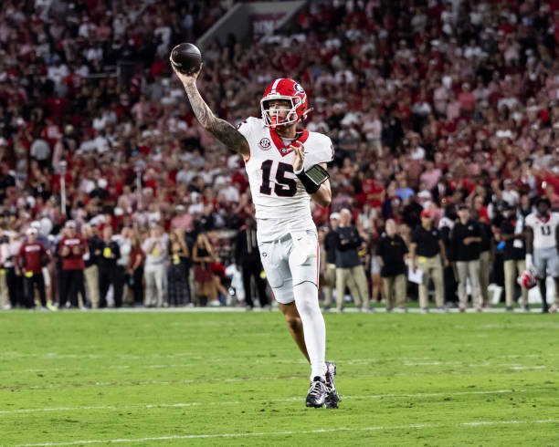 tuscaloosa alabama carson beck of the georgia bulldogs throws a pass during a game between Ye3IJA